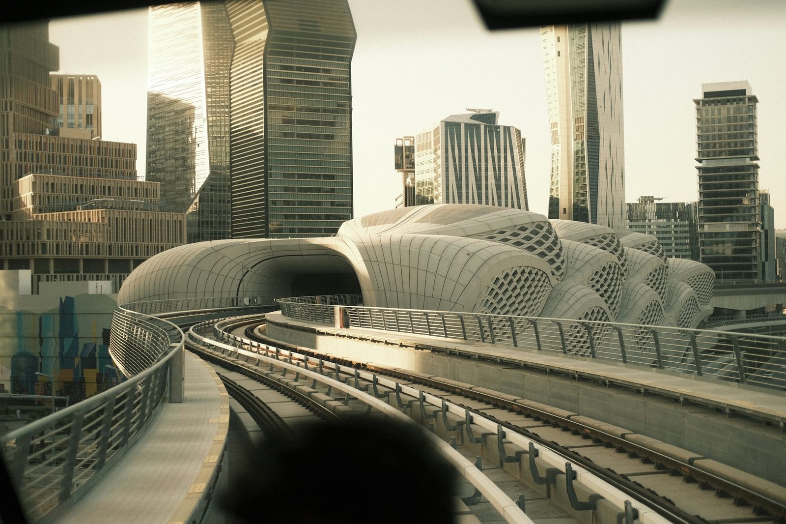 Futuristic Riyadh cityscape with elevated tracks and modern architecture